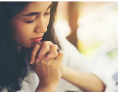 A satwik woman praying